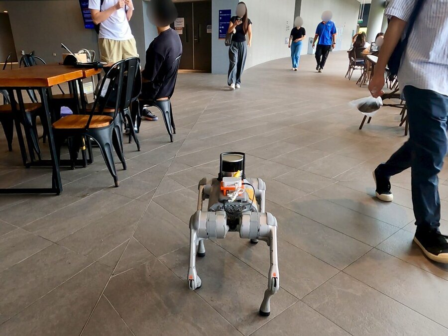 The indoor test scene: the robot approaching people in a corridor-like space.