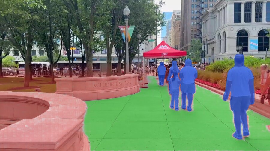 First-person frame of a city street at t = 4 s.